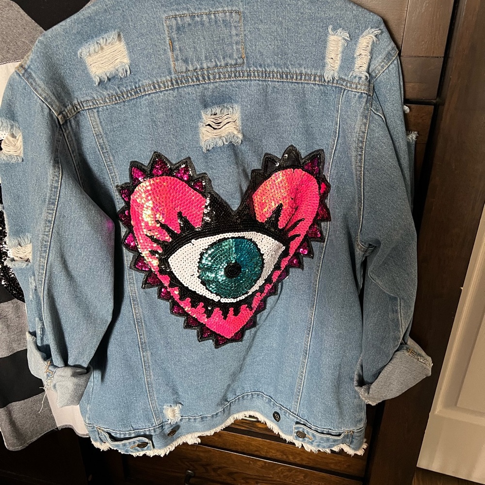 Jean jacket with evil eye in plaid shirt size large